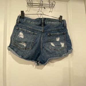 Distressed denim shorts